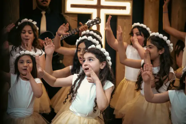 Children performing at a Christmas celebration