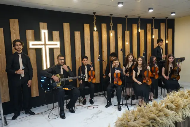 The worship band leading Sunday service